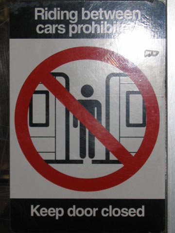 Riding between cars prohibited