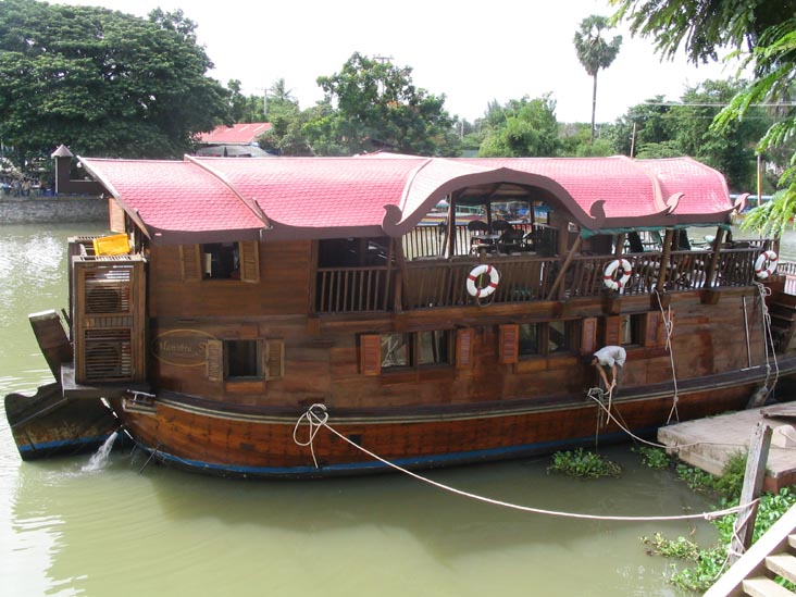 Manohra Song Boat Moored in Front of Wat Nivat, Thailand