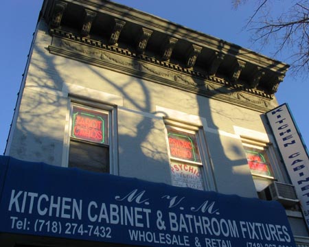 Tarot Reader, MVM Kitchen Cabinet & Bathroom Fixtures, 25-89 Steinway Street, Astoria, Queens, March 13, 2004