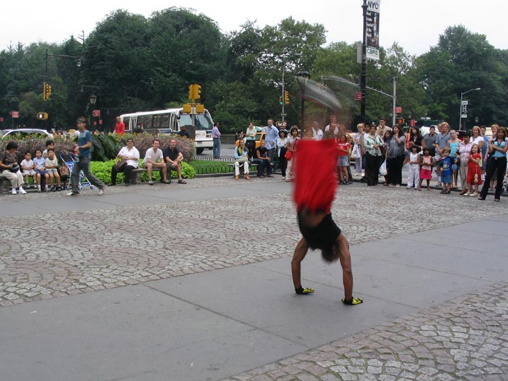 Lunchtime Acrobatics in Grand Army Plaza, Manhattan, August 11, 2004