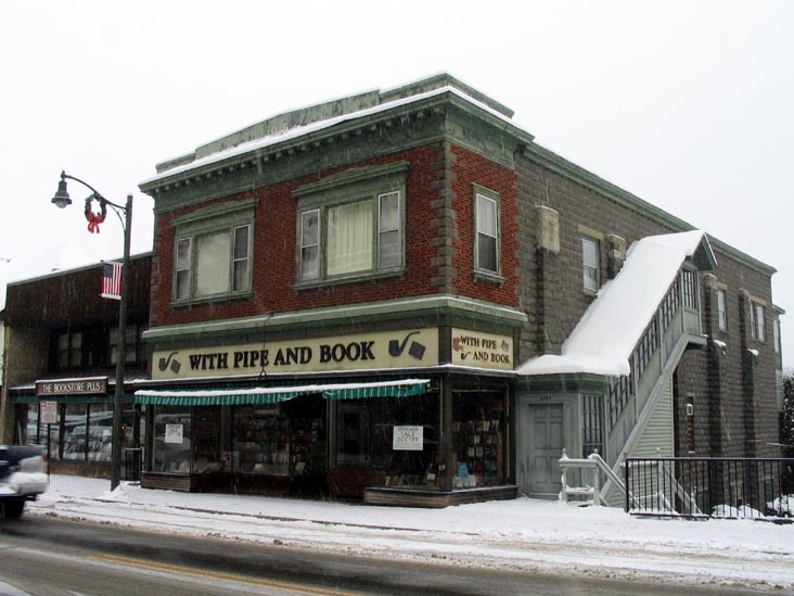 With Pipe and Book, Main Street, Lake Placid, New York