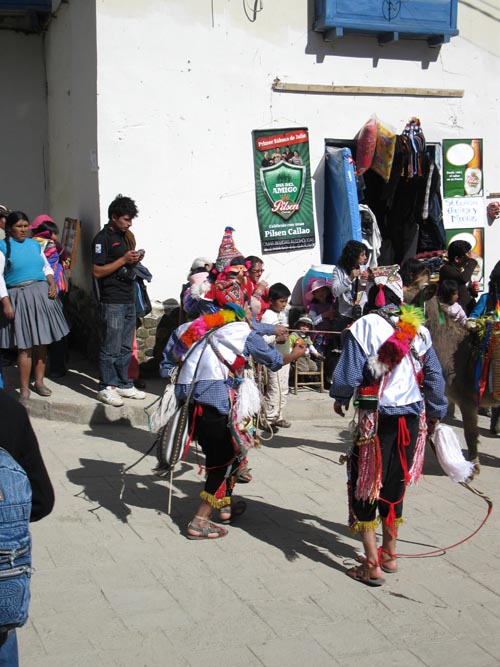 Maqtas Pulling Donkey, Fiesta Virgen del Carmen, Plaza de Armas, Paucartambo, Peru, July 15, 2010
