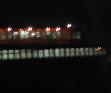 Ferry Passing at Night, New York Harbor, New York